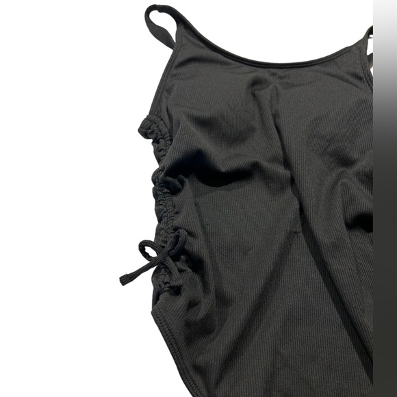 Black semi-thong swimsuit with lacing on both sides - Picture 3 of 7